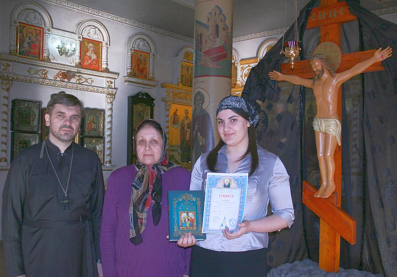 Бабасиева Домна в храме после победы на олимпиаде